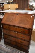 A reproduction Regency bureau, width approx. 76cm