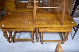 A Cryer craft elm coffee table, with nest of two smaller occasional tables under