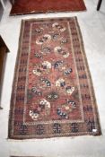 A Persian style rug, approx. 170 x 87 cm