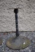 An Art Nouveau style cast table base of tulip form