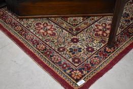 A vintage room sized carpet square (with some cutouts)