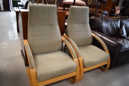 A pair of modern attractive cantilever armchairs, believed to be Verikon (Denmark) upholstered in