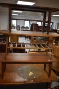 A vintage teak coffee table, approx. 107 x 40cm together with Two other vintage coffee tables