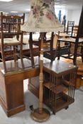 A late 20th century tuned wooden standard lamp, with fluted detail and floral shade 151cm to