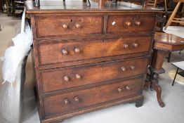 A 19th century mahogany banded oak chest of two over three long graduating drawers, each with