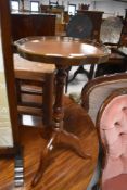 A reproduction mahogany wine table, of traditional design 54cm