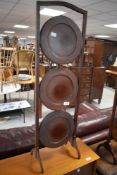 A 1920's mahogany folding three-tier cake stand 89.5cm