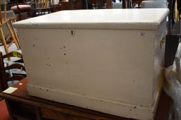 A Victorian painted pine blanket box, of hinged rectangular form with internal candle section.