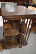 An Edwardian oak revolving bookcase, of traditional design 84cm