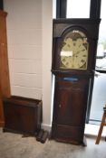 A Victorian mahogany eight day long case clock, the arched painted dial with rolling moon phase,