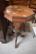 A Victorian mahogany and walnut sewing table, with satinwood inlay decoration (af)