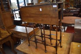 An Edwardian mahogany Sutherland table, having slender turned 'faux bamboo' supports, 72cm x 58cm