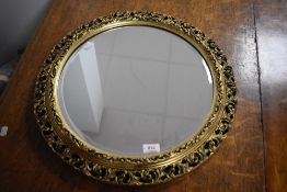 A gilt frame wall mirror of circular form, diameter approx. 51cm