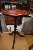 A reproduction mahogany wine table 50cm