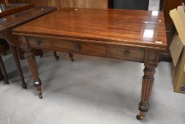 A 19th century mahogany draw-out library table, of Gillow quality, having a rectangular top above