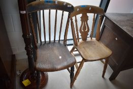 A Victorian elm seated spindle back chair, seat height 44cm together with a later elm seated kitchen