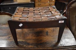 Arthur W Simpson, The handicrafts, Kendal An Arts and Crafts oak stool, the typical concaved seat