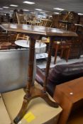 A late Victorian octagonal occasional table with three turned supports and trefoil base 71cm