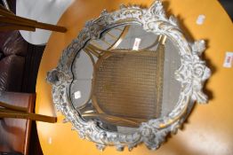 A reproduction Rococo style wall mirror, approx. 64 x 47cm