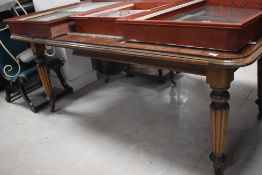 A Victorian style mahogany banquetting table in the Gillows style