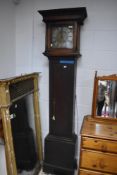 An 18th century oak long case clock, by Edward Bullock, Ellesmere, the flat-topped hood over the