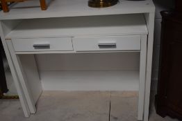 A white laminate side table