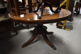 A 19th Century pedestal style circular dining table, diameter approx. 120cm