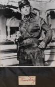 Doris Day (1922-2019) an autograph in red ink along with a monochrome photographic image of the