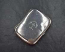 A George V silver cigarette case of hinged square form, having engraved cross and 'A Cruce Salus'