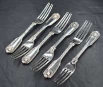 A set of six Victorian silver fiddle pattern forks, having thread and shell decoration with engraved