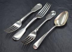 A pair of William IV silver fiddle pattern forks, having an engraved heraldic crest and 'EJC'