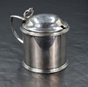 A Victorian silver condiment pot, of circular form having decorative pierced lid opener with angular