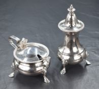 A George V silver sugar caster and condiment pot with spoon, of baluster form having bead thread