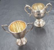 A George V silver trophy, of traditional form having c-curve handles, engraved 'Radcliffe YMCA