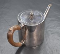 A George III silver bachelors tea pot, of traditional form having decorative engraving to the lid,