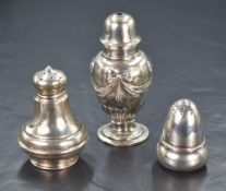 A George V silver salt shaker, having embossed ribbon bow swags and gadrooned base to the body,