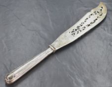 A Victorian silver King's pattern fish serving knife, the blade having scroll decoration with a