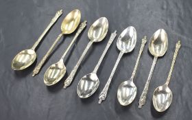A group of nine silver plated apostle spoons, of traditional form comprising two sets of three and