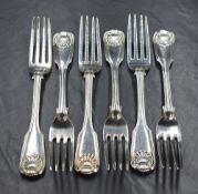 A set of six Victorian silver fiddle pattern forks, having thread and shell decoration with engraved