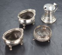 A pair of early 20th century silver salts, of oval form having gadrooned and shell style rims,