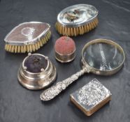 An Edwardian silver fronted miniature book of common prayers, having embossed clouds and cherubs,