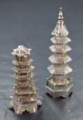 Two Chinese white metal pagoda form pepperettes, marks for Yung Lei (1880-1915) to one and Chinese