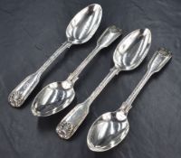 A set of four Victorian silver fiddle pattern spoons, having thread and shell decoration with