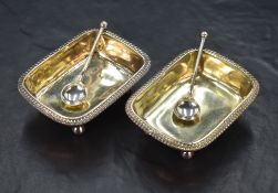 A pair of George III silver salts, of rectangular form having egg and dart rims, with 'TJL' monogram