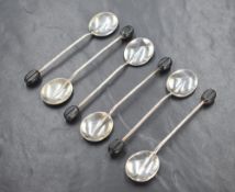 A cased set of George V silver coffee bean spoons, having a rat tail style design, marks for
