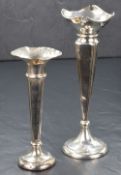 A George V silver vase, of fluted form having a decorative quatrefoil rim with square canted body,