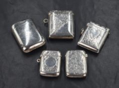 An Edwardian silver vesta case, having engraved scroll work with one vacant corner, marks for