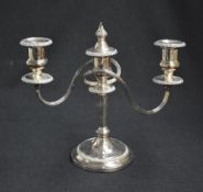 A silver plated two-branch candlestick, of turned and circular form, the central columns flame