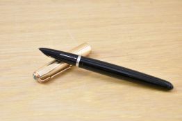 A Parker 51 aerometric fill fountain pen in black with rolled gold cap