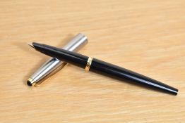 A Parker 45 cartridge fill fountain pen in black with lustraloy cap with gold trim